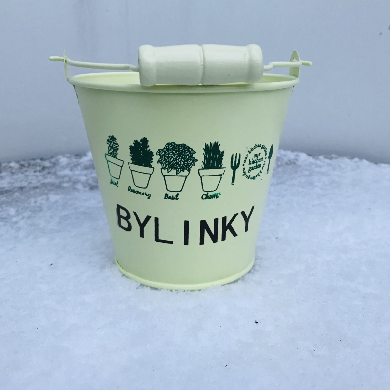 Obal  kovový žltý bylinky